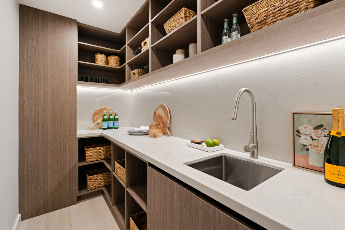 Pantry and storage space inside a completed KOKOMO residence.